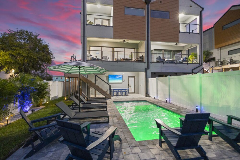 Experience modern coastal luxury in this spacious retreat, where open-concept living meets resort-style amenities—featuring private balconies, a heated pool, and inviting indoor-outdoor spaces designed for relaxation and connection.