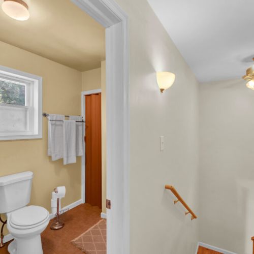 Upstairs bathroom right next to the bedrooms