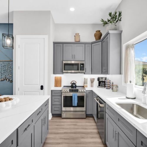 Modern kitchen fully equipped for group meals and celebrations.