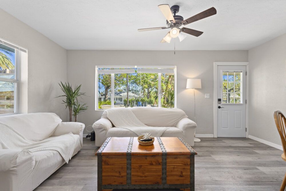 Spacious living room. Blinds, front door, deadbolt.