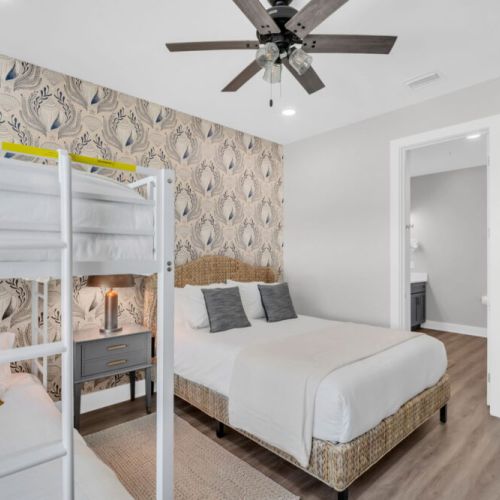 Beautifully designed shell room perfect for families or singles. Queen bed and twin XL bunk beds.