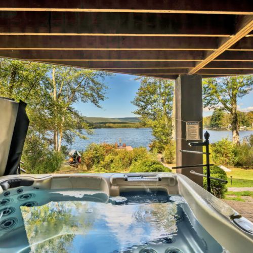 6-person Tropic Sea Spas RIO Spa with beautiful lakefront views.