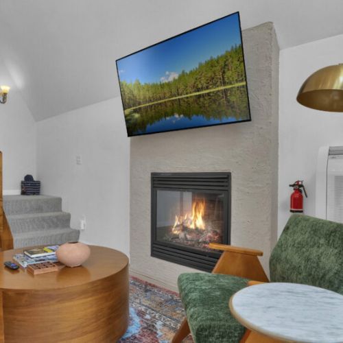 Cozy up by the warm glow of the gas fireplace, perfect for relaxing