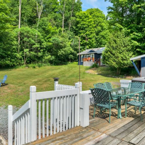 Dine al fresco! Spacious patio table with beautiful water views.