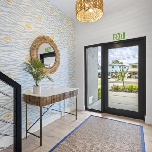 Step inside and feel instantly at home in this bright, welcoming beachside entryway.