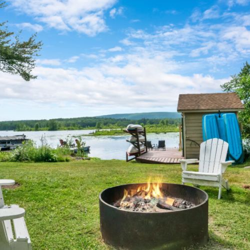 Gather around the lakeside firepit for cozy evenings under the stars.