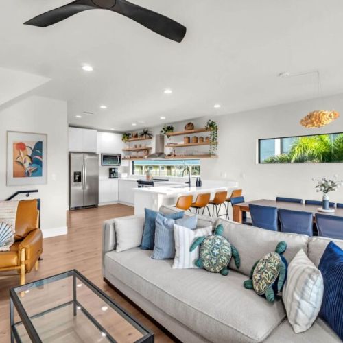 A thoughtfully designed, open-concept living, dining, and kitchen area — perfect for gathering, making memories, and staying connected.