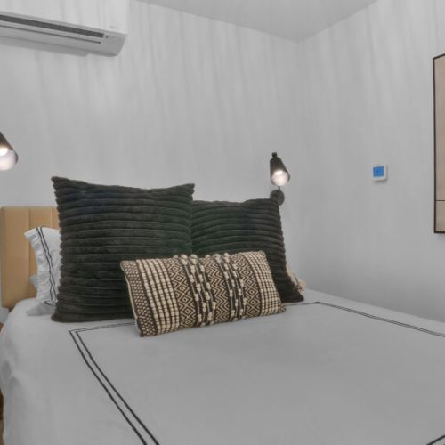 Cozy basement queen bedroom, perfect for a quiet and restful retreat.