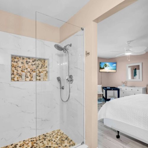 The ensuite bathroom with a walk-in shower