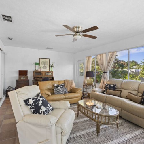 Gather around in the Florida room and lounge on the comfortable furniture. Enjoy coffee in the AM, throw on your favorite flick in the PM.