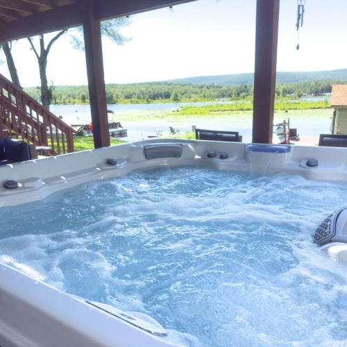 Hang out in the covered hot tub and enjoy the lake view. What can be better?