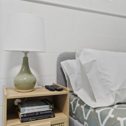 Queen bedroom equipped with smart TV for relaxing evenings in.