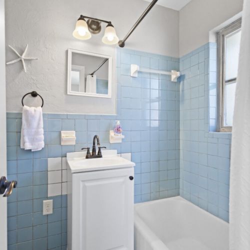 Full bathroom with tub.
