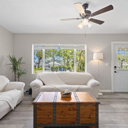 Spacious living room. Blinds, front door, deadbolt.