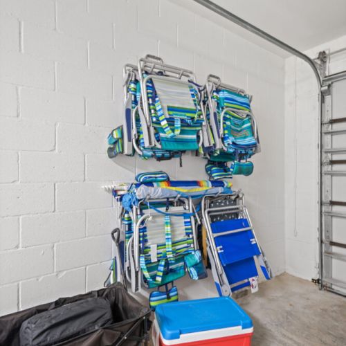 Everything you need for a perfect beach day—chairs, wagon, tent, and cooler—all provided for guest use.