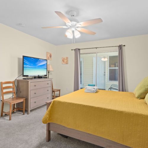Tv, fan, entrance to the breezeway.