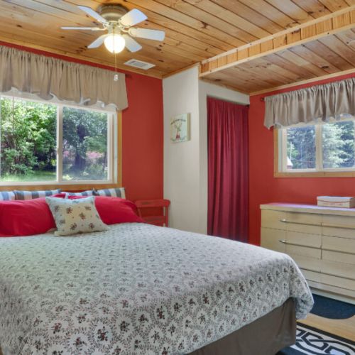 Rustic comfort meets nature views right from your bed. The perfect sanctuary after a long day of exploring.