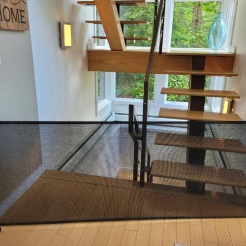 Mesh baby gate on the main level and basement. Perfect to enclose kids and pets. We also have one for the top of the deck.