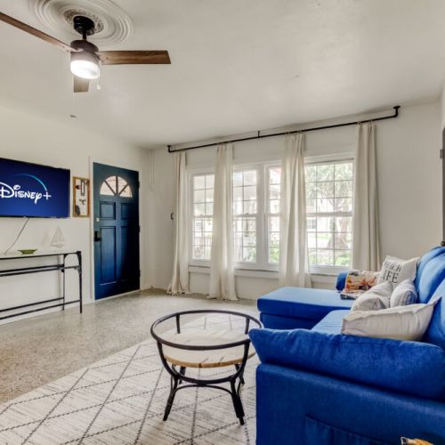 Entrance, living room, tv, fan, table