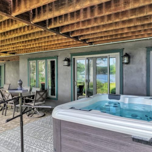 6 person hot tub and patio with seating for the whole crew