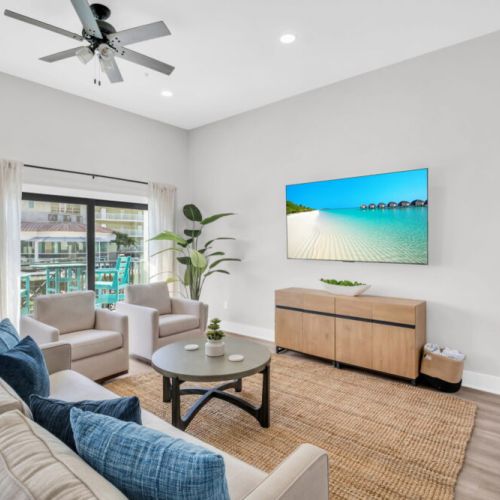 Comfortable seating, 65" TV, balcony with ocean views just outside to catch up.