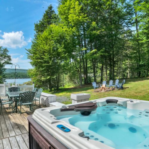 Soak and unwind. End your day relaxing in the outdoor hot tub with unbeatable views of the surrounding nature.