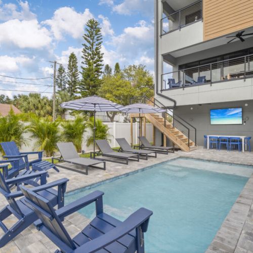 Enjoy sunny days and relaxing evenings by the pool, gather for meals at the outdoor dining table, and catch your favorite shows on the 75" outdoor TV in this perfect backyard retreat.