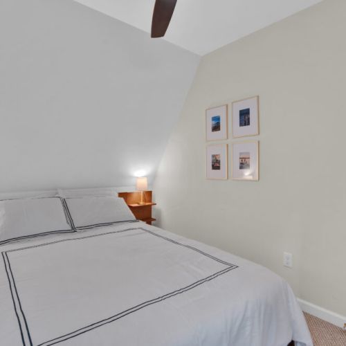 Unwind in this cozy queen bed. Perfect for vacation naps and getting a good nights rest. Night lights for reading.