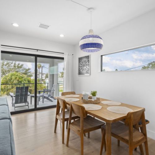 Gather around this stylish dining area, perfect for shared meals and memorable moments.