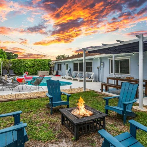 Outdoor Oasis: Sizzle by the fire pit and splash in the pool under radiant sunsets!
