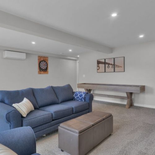 This game room also features a sleeper sofa, providing additional sleeping space for your group!