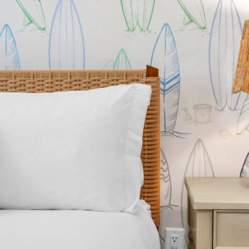 Soft textures, blackout curtains, and peaceful design.