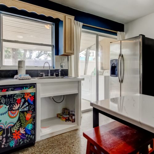 Dishwasher, sink, dining area, back yard