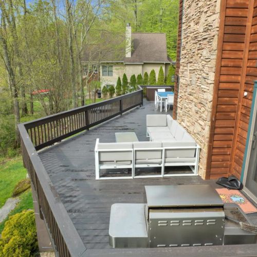 Grill and outdoor sectional.