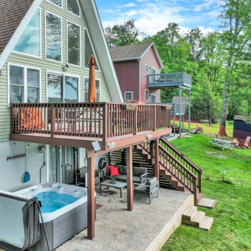 Relax in the hot tub and unwind in the inviting outdoor lounge area.