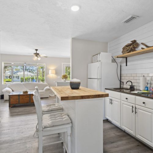 Coffee maker, microwave, kitchen essentials.