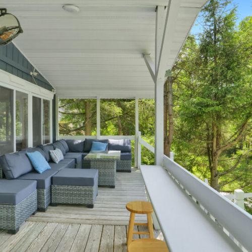 Comfortable outdoor seating to enjoy the breeze and nature views.