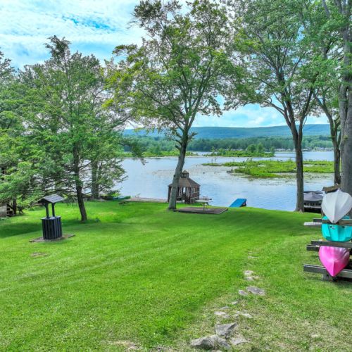 Kayaks ready by the lake to go on an adventure!