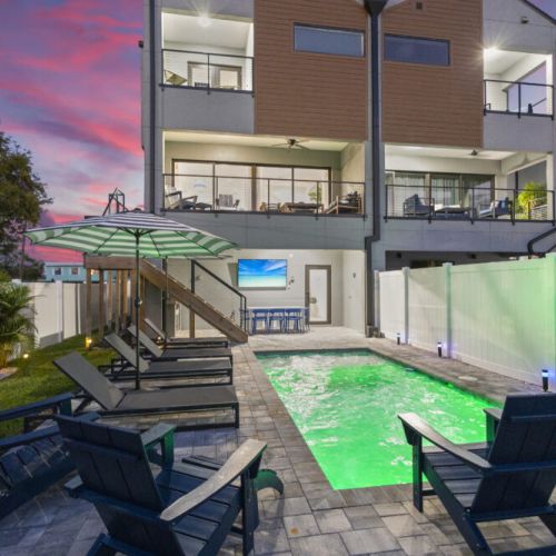 Experience modern coastal luxury in this spacious retreat, where open-concept living meets resort-style amenities—featuring private balconies, a heated pool, and inviting indoor-outdoor spaces designed for relaxation and connection.