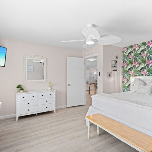 Tropical-inspired master king bedroom designed for a serene and restful escape.