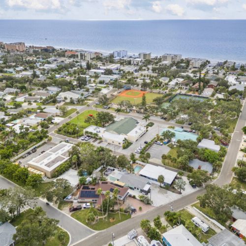 A stunning aerial view of Indian Rocks Beach, showcasing this charming rental steps away from the sand and surf.