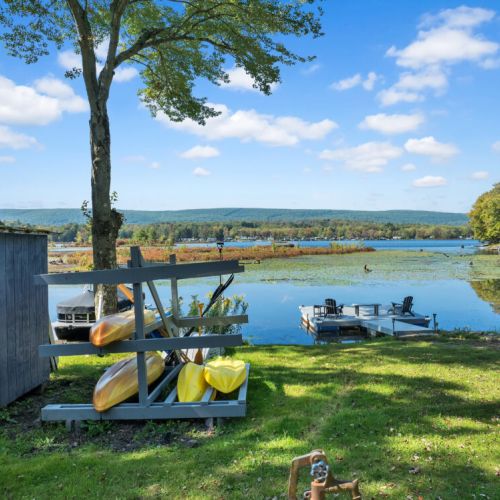 Kayaks right by the water.