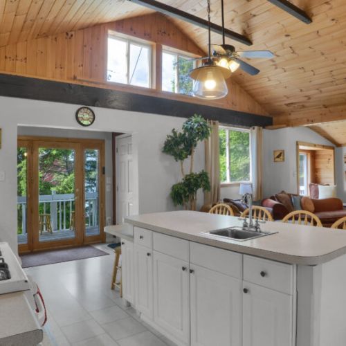Cook, dine, and relax with ease in this spacious open-layout living area, perfect for entertaining family and friends.