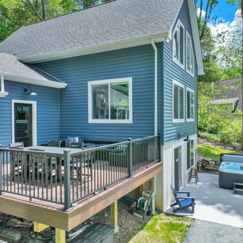 Enjoy meals, conversations, and sunsets from the deck.