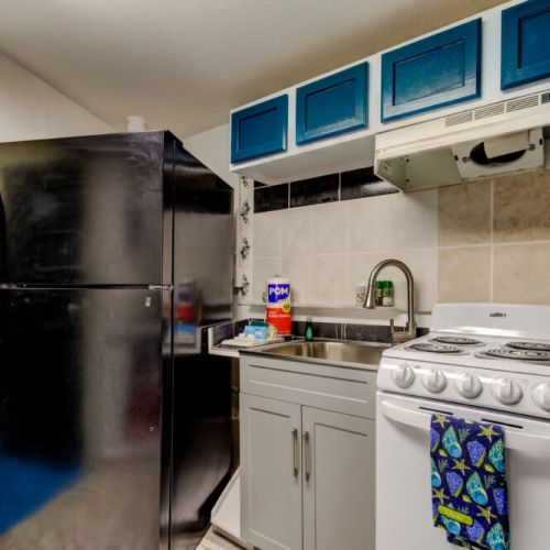 Full Kitchen - Refrigerator, Oven, Sink, Microwave.