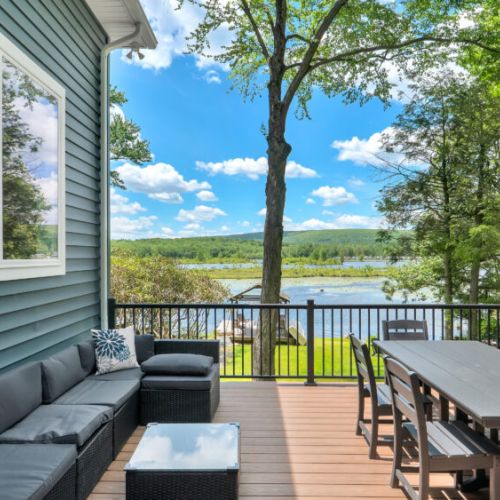 Take in beautiful lake views from the spacious outdoor deck.