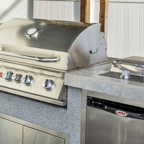 Built-In Grill and mini fridge for your convenience. Burner grill, separate burner for pots.