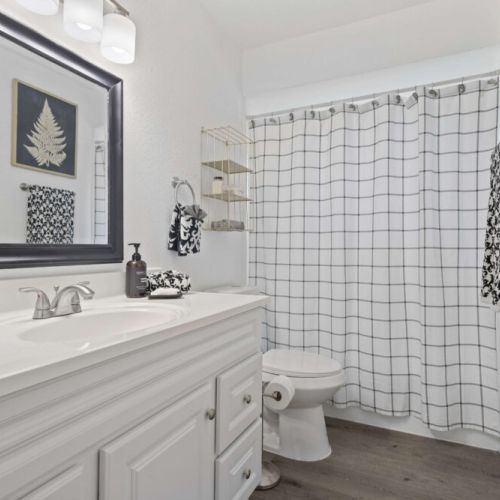 Spacious bathrooms with fresh, clean style.