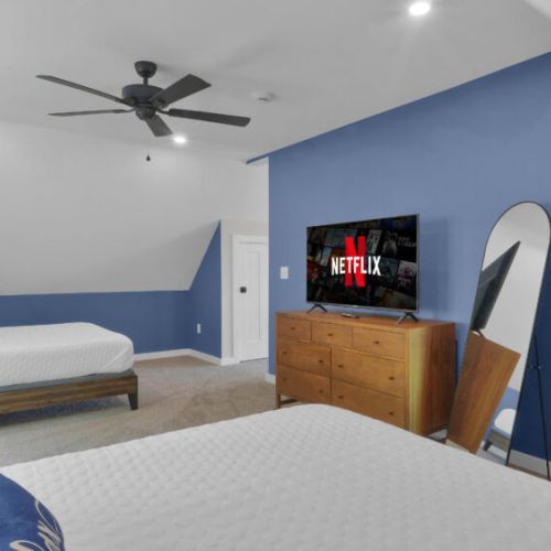 Perfect for kids or friends, this room features a TV for relaxing after a fun day outside!