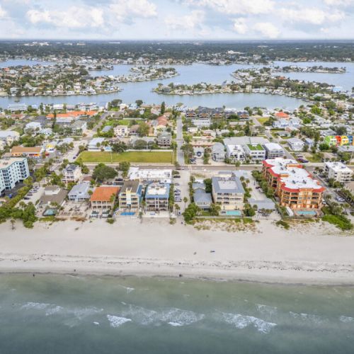 Perfectly situated between the sparkling beach and serene bay, this home offers the best of both worlds